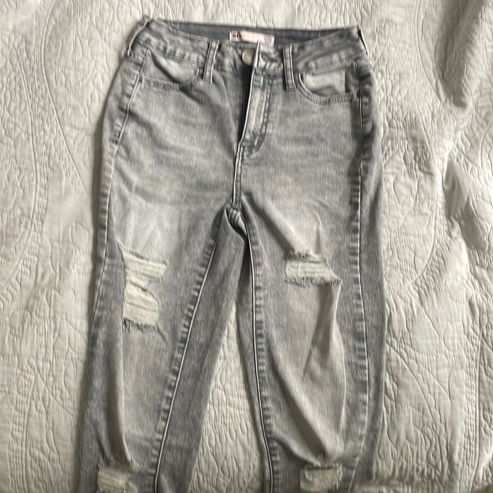 Kohl’s skinny jeans with rips , size 24 , high rise , brand new
